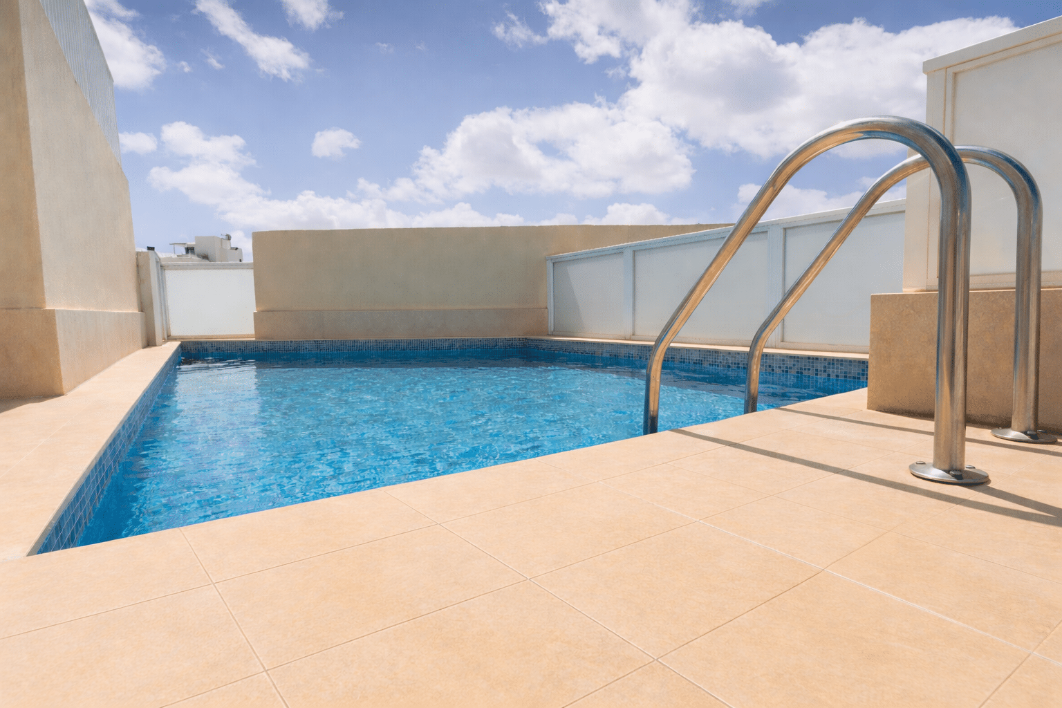 Spend the day by our rooftop pool.