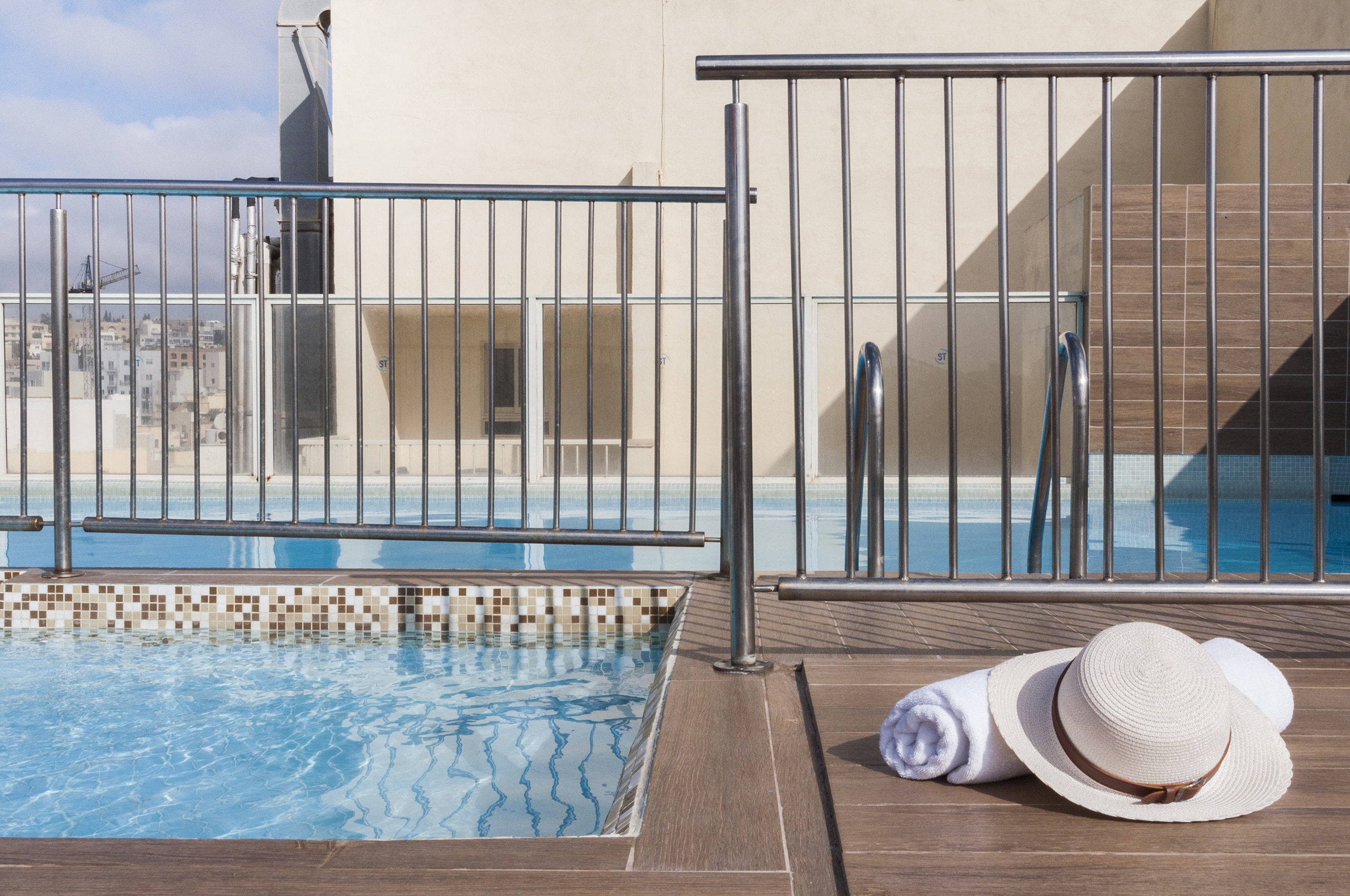 Spend the day by our rooftop pool.