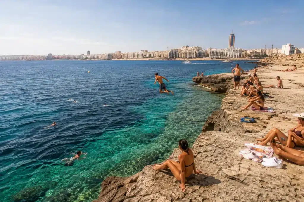 rocky swimming spots Malta summer 2026 limestone coast