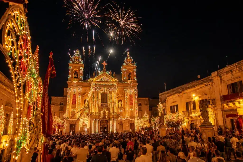 Fireworks display over Maltese church dome during village festa summer 2026