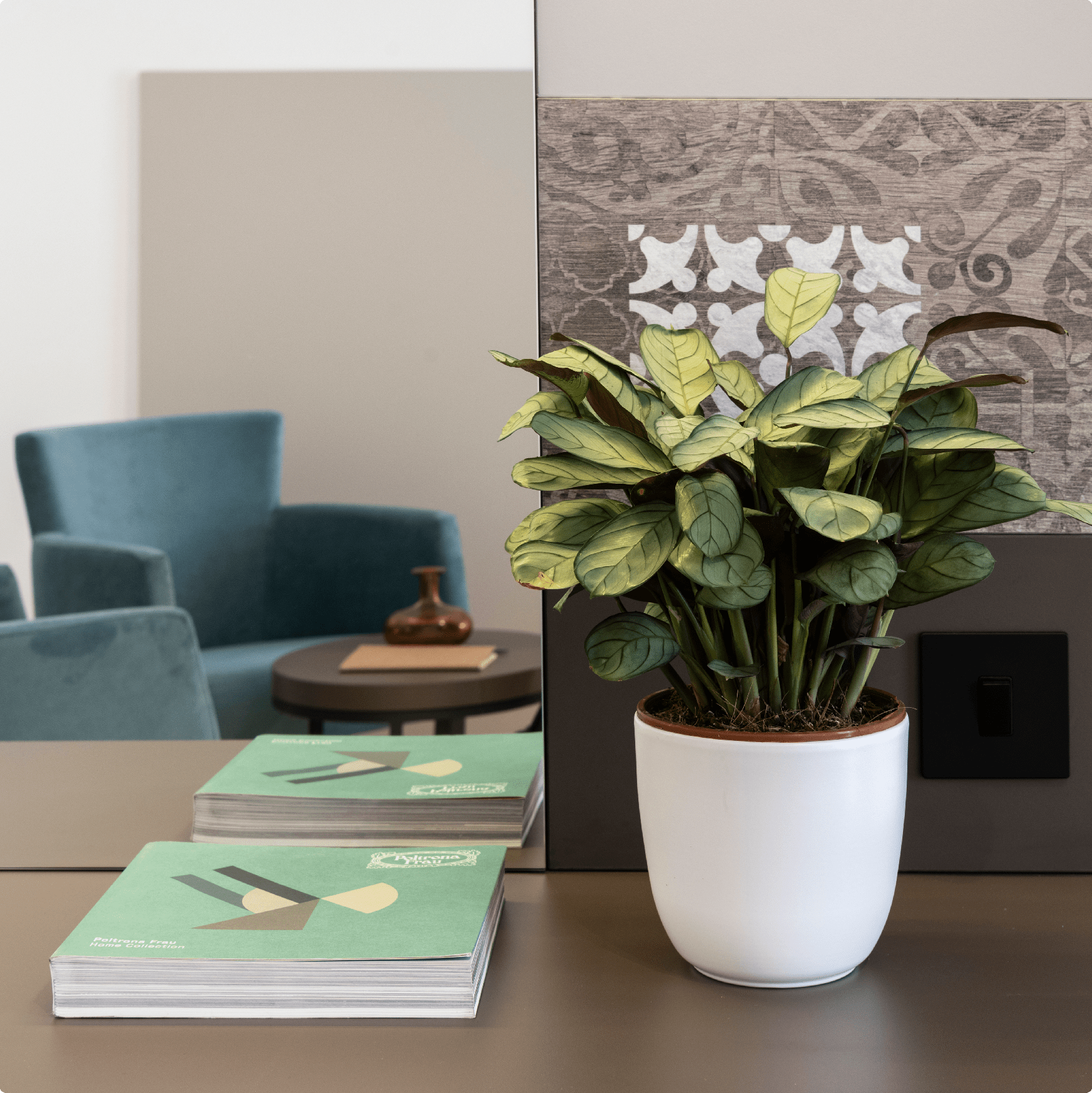 a mirror and a vase that shows decoration of a Standard room by St Hotels